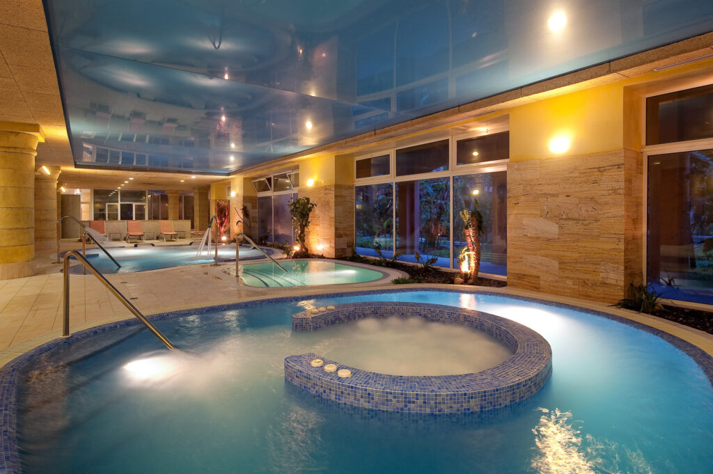 Indoor pool and hot tub at Gran Hotel Elba Estepona