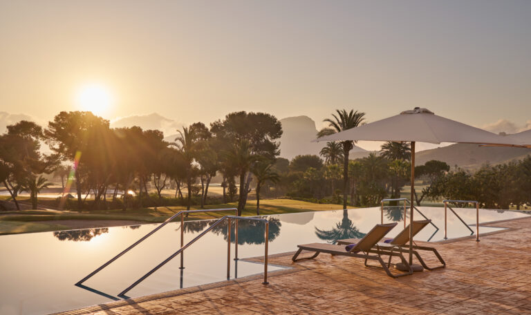 Outdoor pool with loungers at Grand Hyatt La Manga Club Golf & Spa