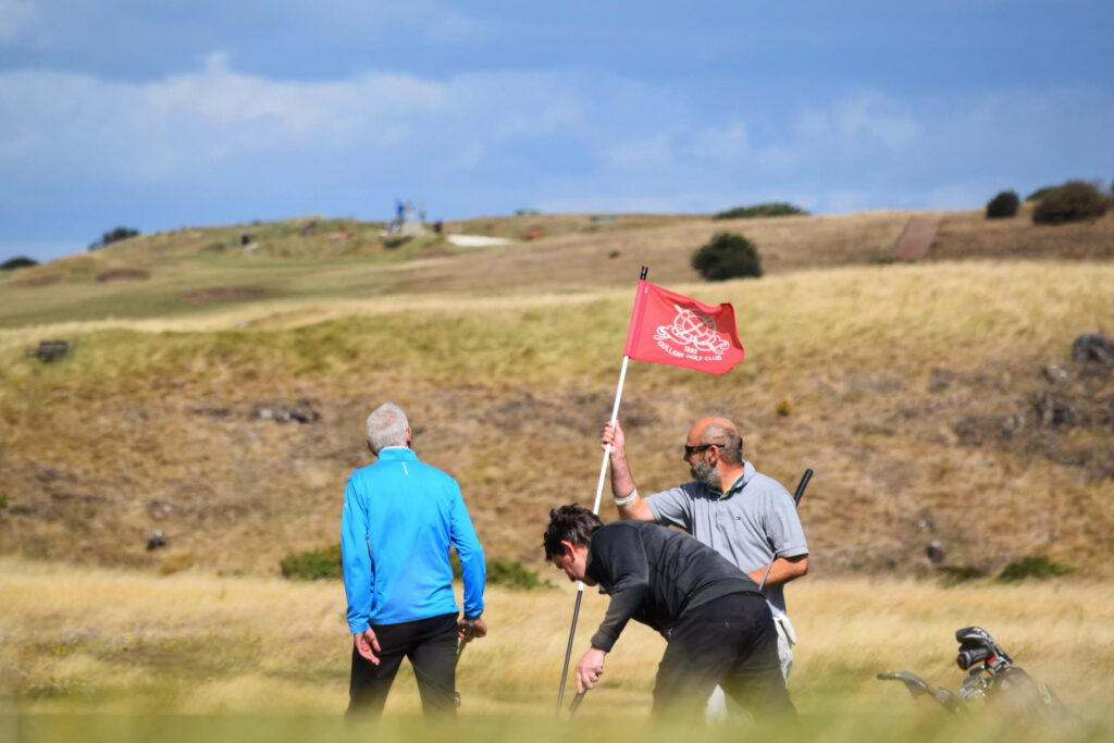 People playing golf at Gullane Golf Club - No. 2 Course