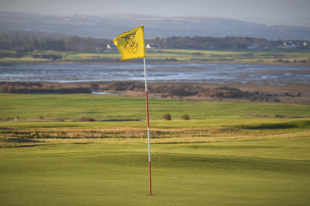 Hole with yellow flag at Gullane Golf Club – No. 3 Course