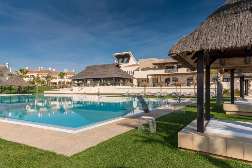 Outdoor pool at Hacienda Del Alamo Golf Resort