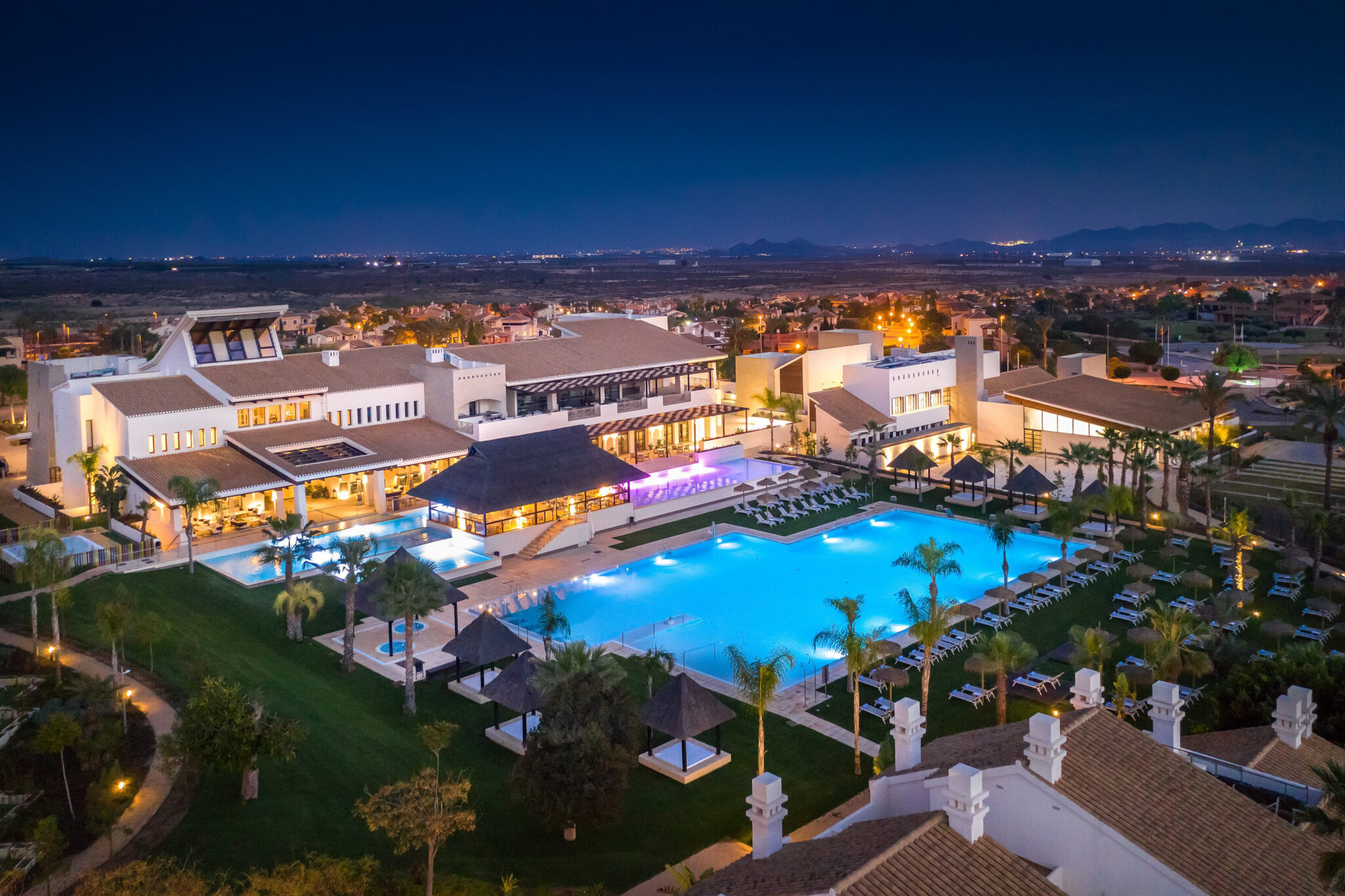 Aerial view of Hacienda Del Alamo Golf Resort at night