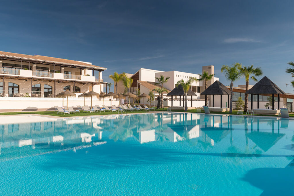 Outdoor pool at Hacienda Del Alamo Golf Resort