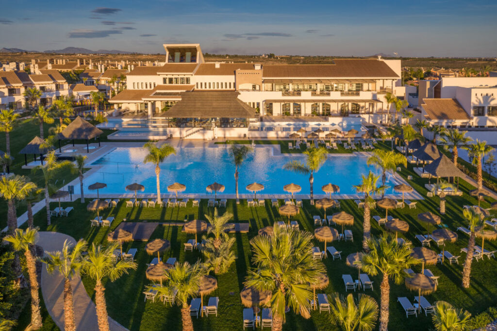 Aerial view of Hacienda Del Alamo Golf Resort with outdoor pool