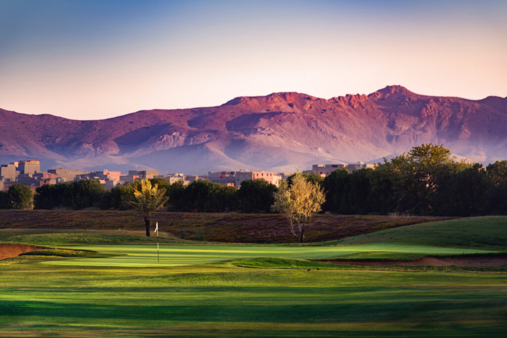 Fairway with mountains in distance at Hotel du Golf Rotana