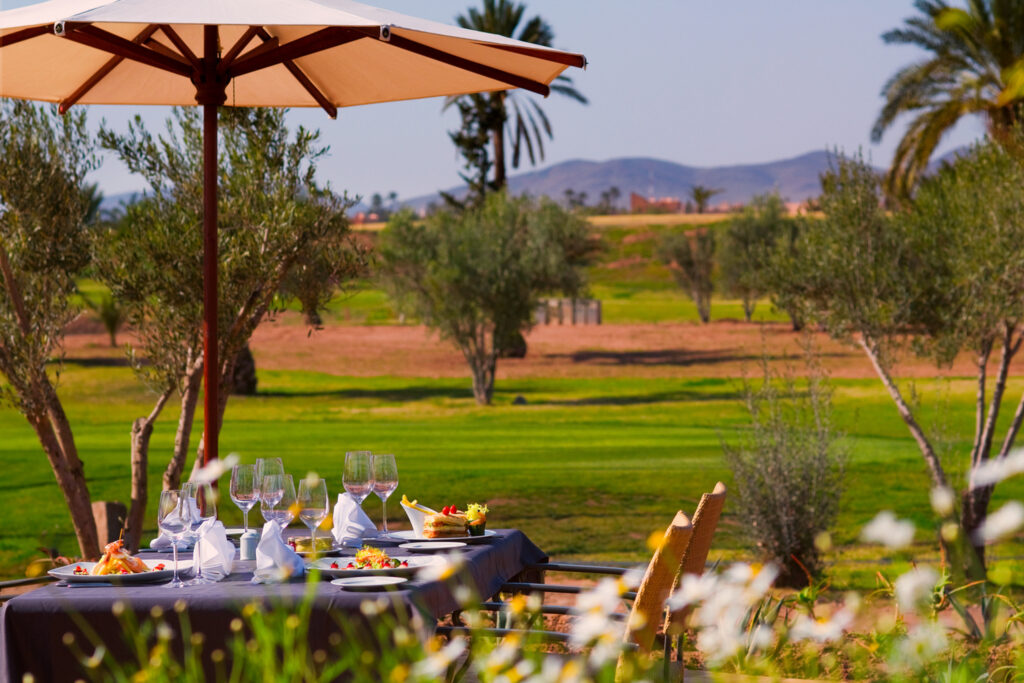 Outdoor dining at Hotel du Golf Rotana