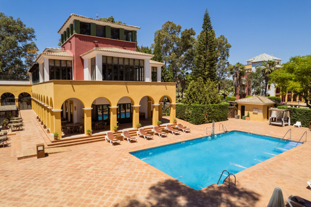 Exterior of Hotel Isla Canela Golf with outdoor pool