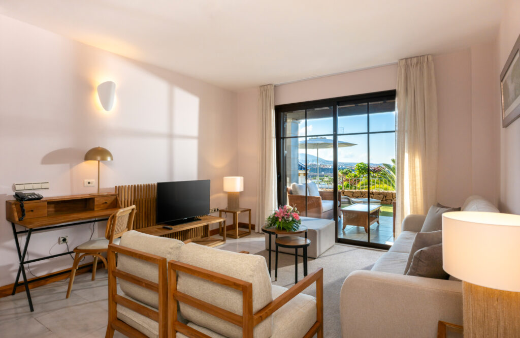 Hotel Villa Maria Suites lounge area with patio doors