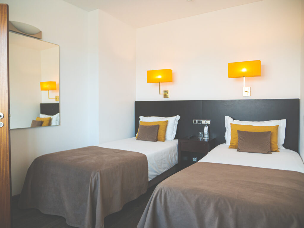 Twin bed accommodation at Hotel Baia