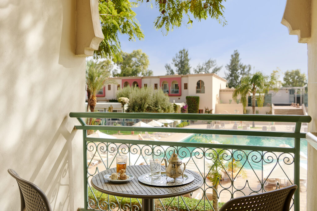 Balcony at Iberostar Club Palmeraie Marrakech with view of the outdoor pool