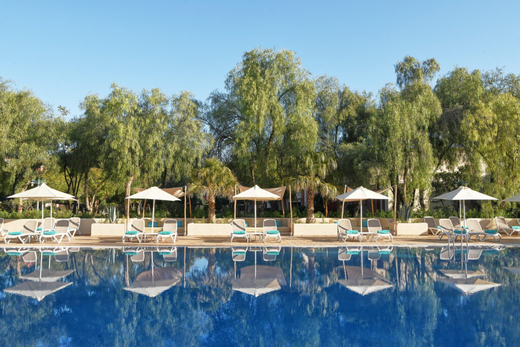 Outdoor pool with loungers at Iberostar Club Palmeraie Marrakech