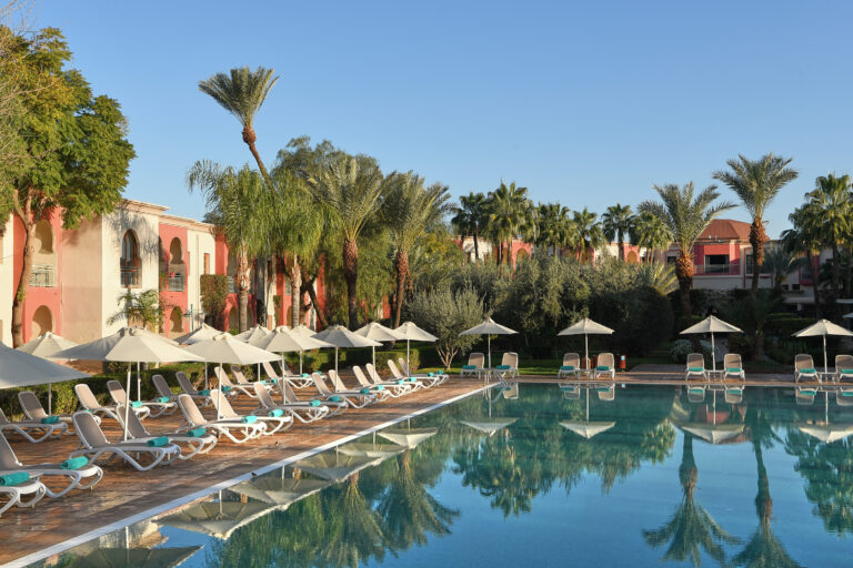 Outdoor pool with loungers at Iberostar Club Palmeraie Marrakech