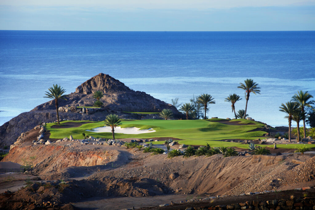 Fairway with bunker and trees with ocean view at Anfi Tauro