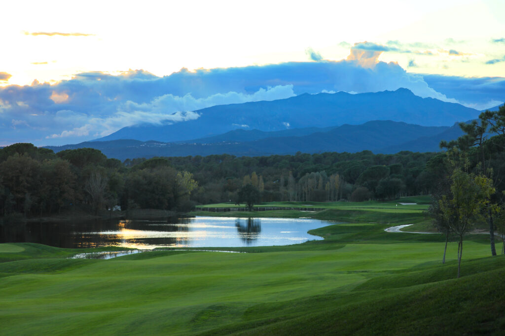 Fairway with lakes and trees around at Camiral Golf & Wellness - Stadium Course