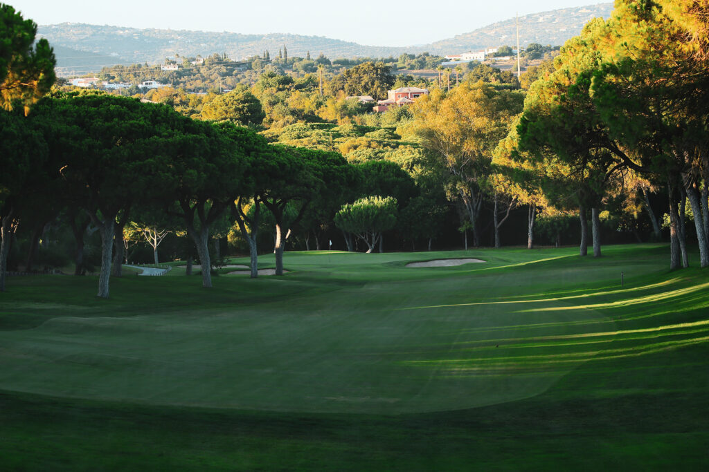Fairway with trees around it at Dom Pedro Old Course