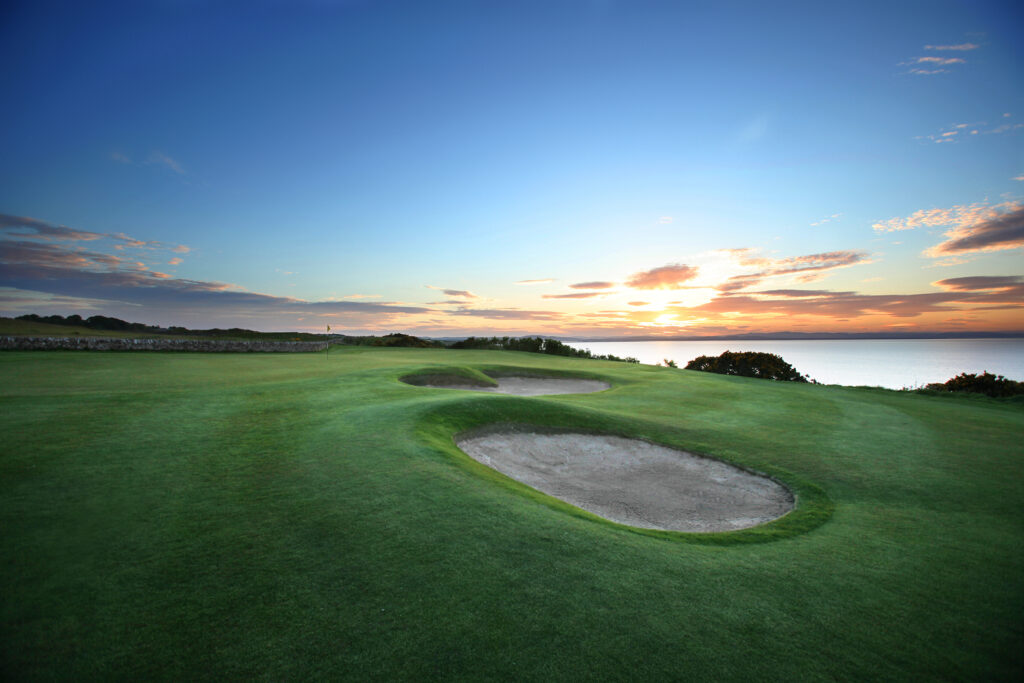 Hole with bunkers at Fairmont St Andrews - Kittocks overlooking the ocean