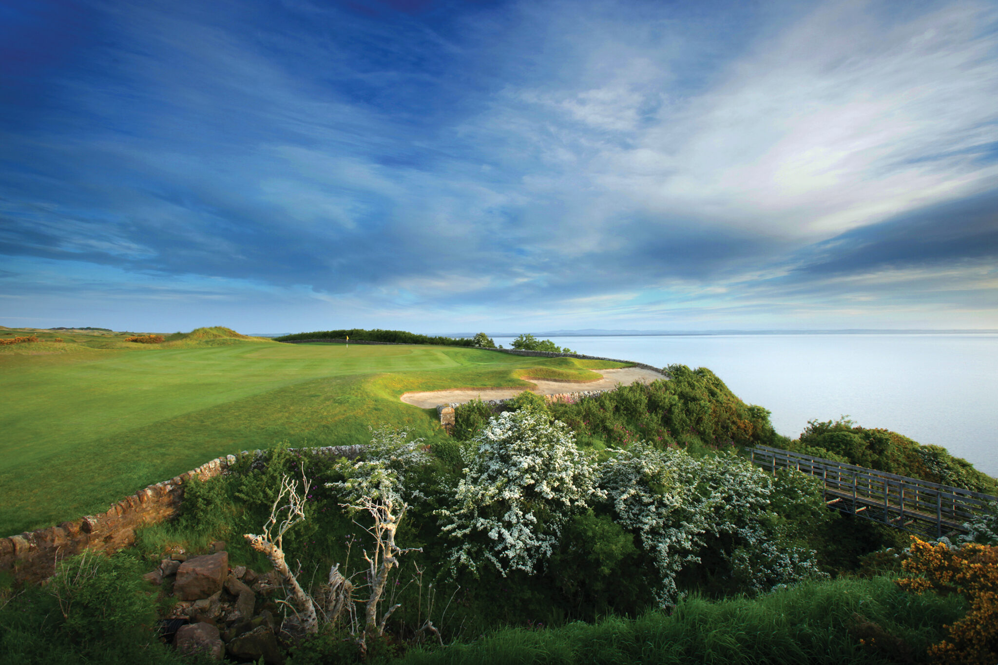 Fairway with bunker at Fairmont St Andrews - Kittocks overlooking the ocean