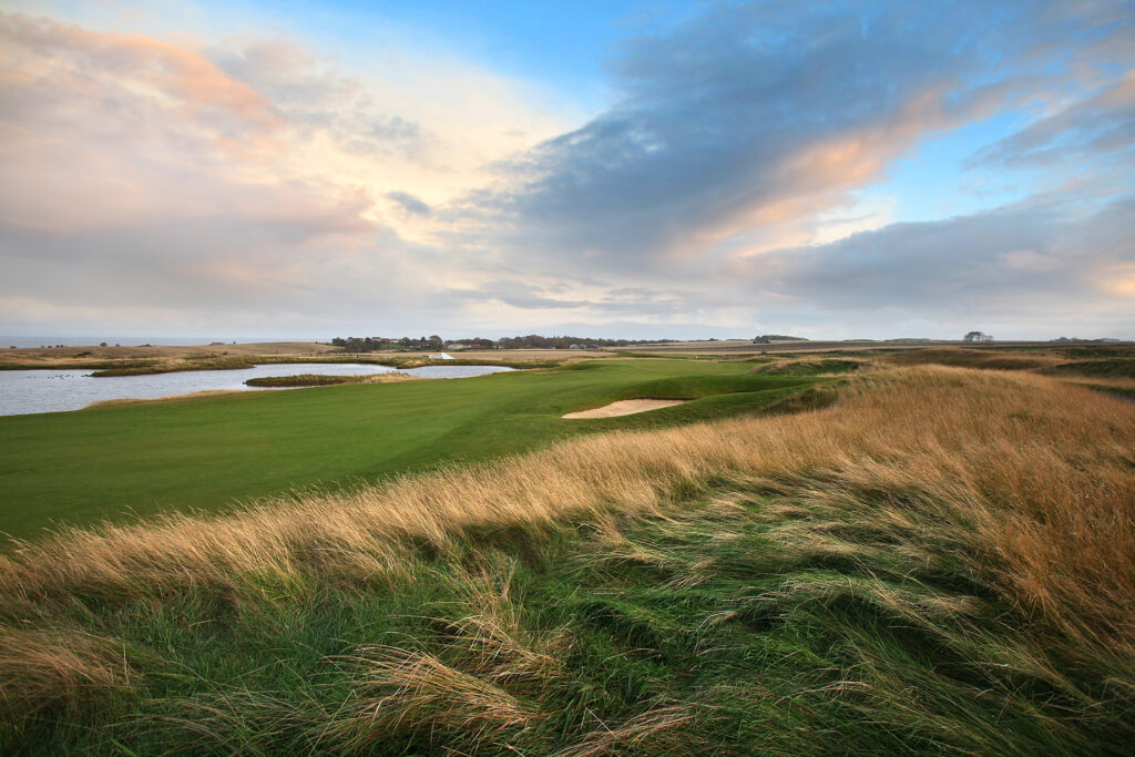 Fairway at Fairmont St Andrews - Torrance with bunkers and a lake in background