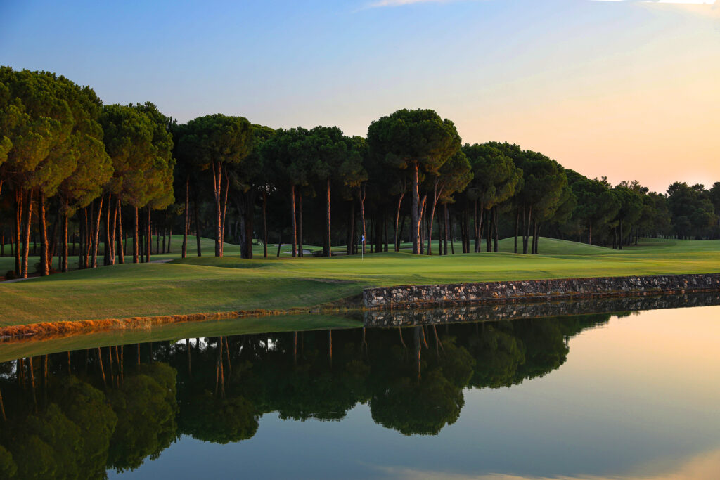 Lake with trees on fairway in background at Gloria - New Golf Course