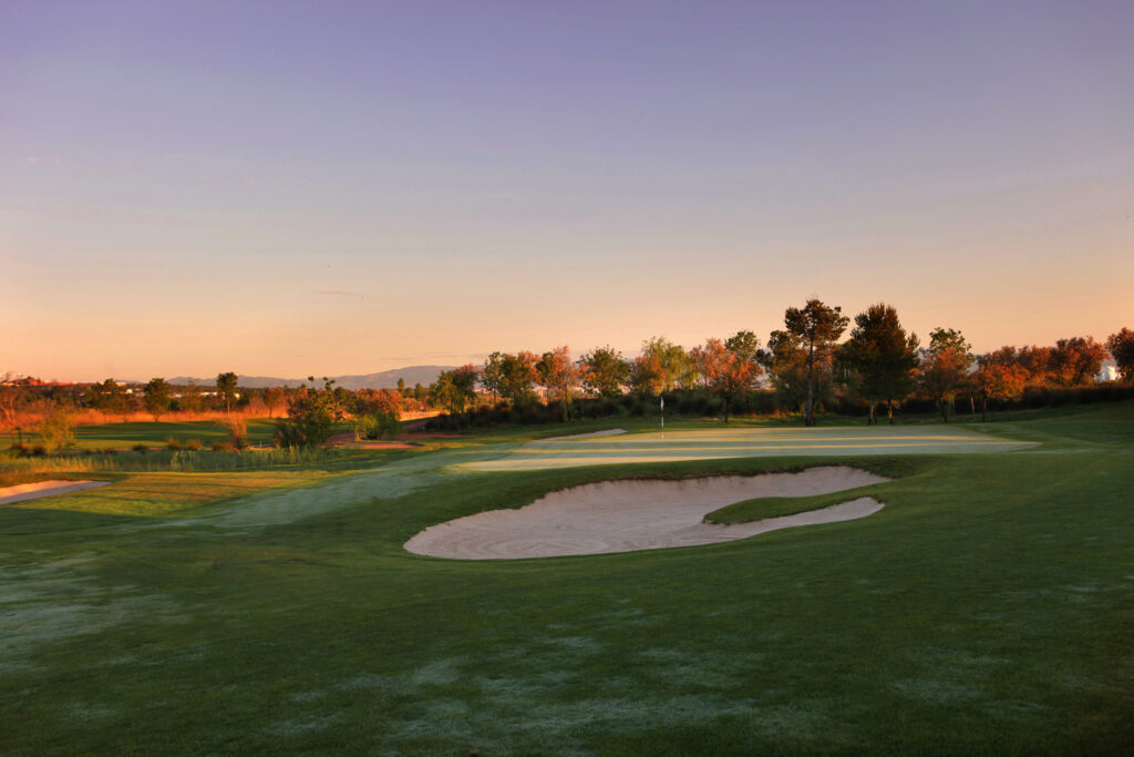 Bunker around a hole at Infinitum Lakes Course