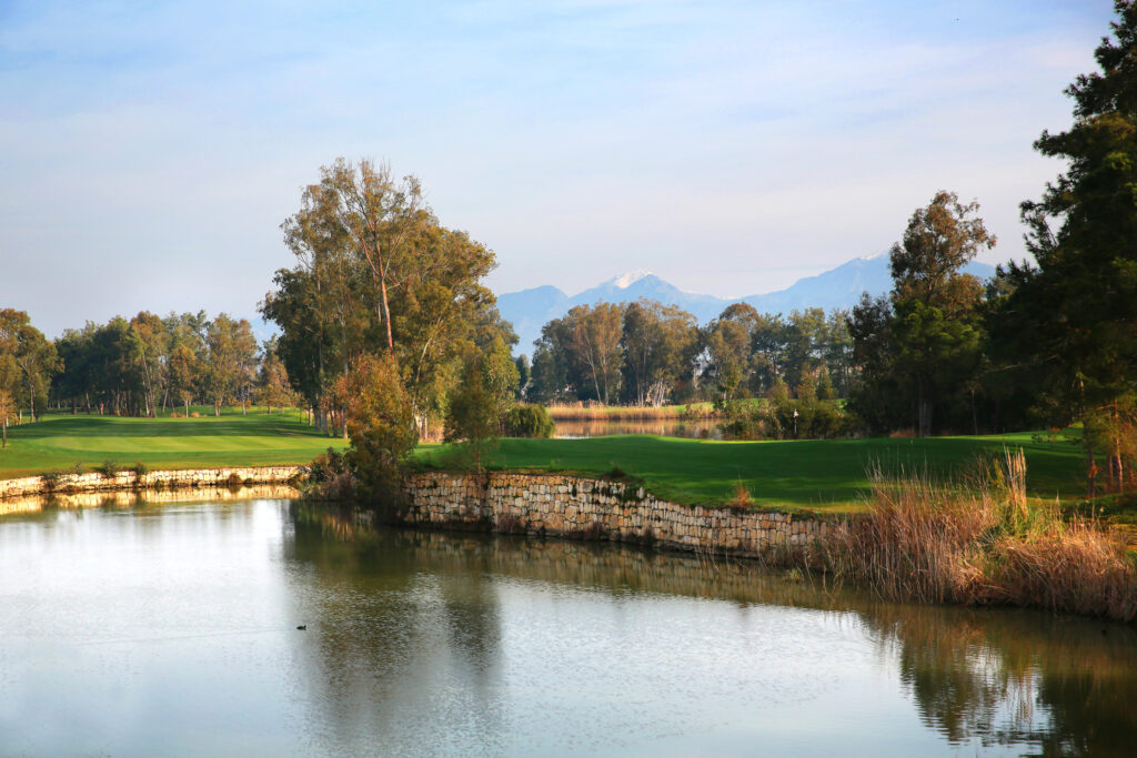 Lake on fairway with trees around at Kaya Palazzo Golf Club