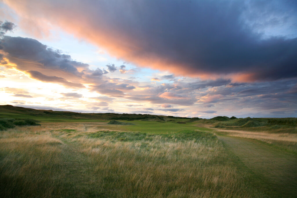 Fairway at Kingsbarns Golf Links with a pink hue in the sky