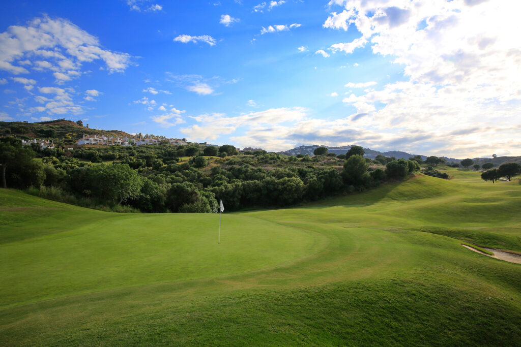 Hole with trees in background at La Cala - America Golf Course