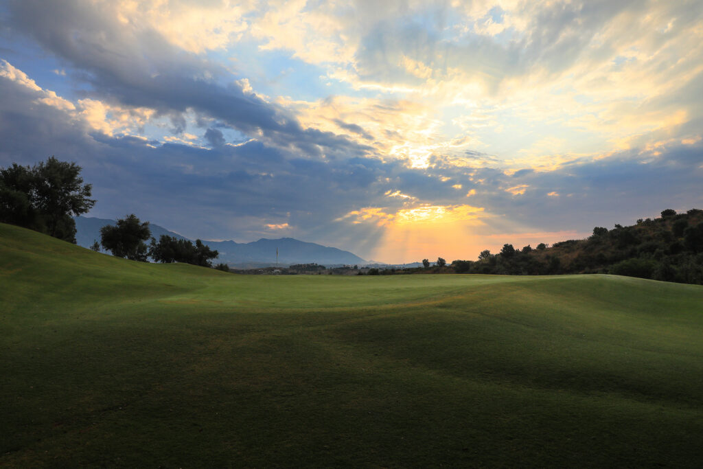 Hole at La Cala - Asia Golf Course at sunset