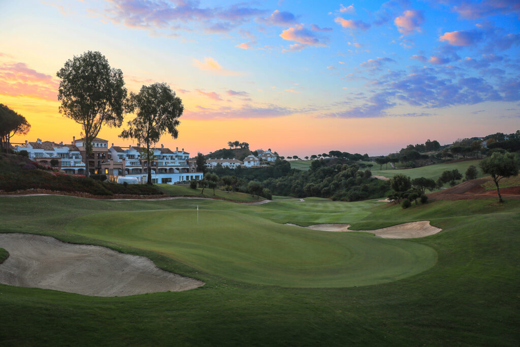 Hole with bunker at sunset at La Cala - Asia Golf Course