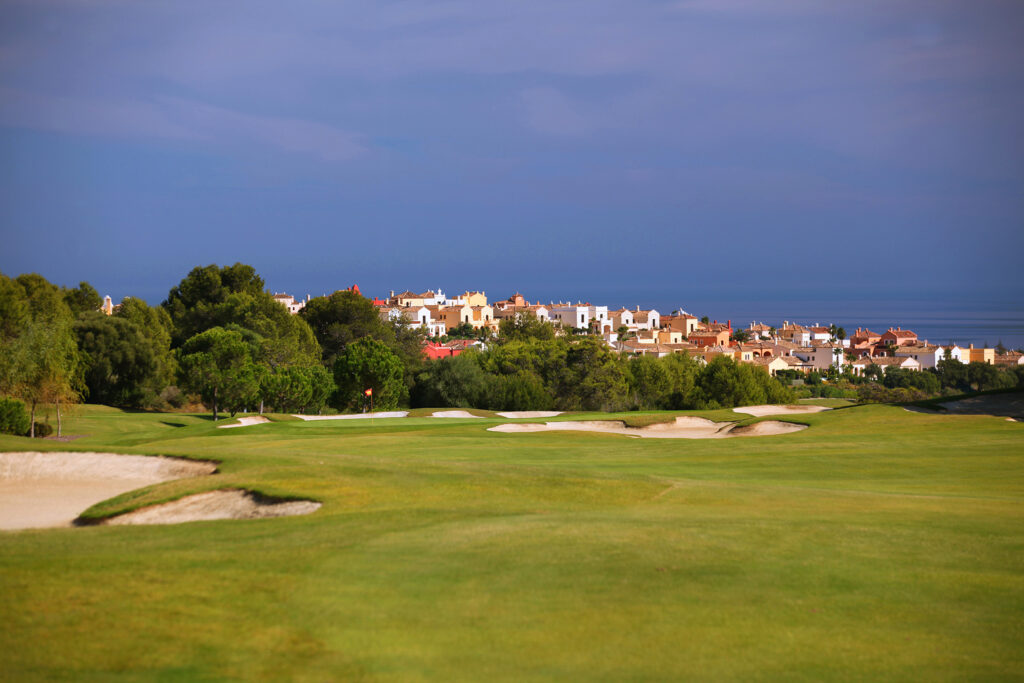 Fairway with bunkers and trees in background at La Reserva de Sotogrande Golf Course