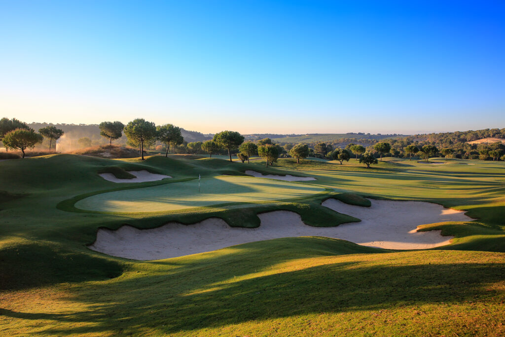 A hole with bunkers at Las Colinas Golf & Country Club