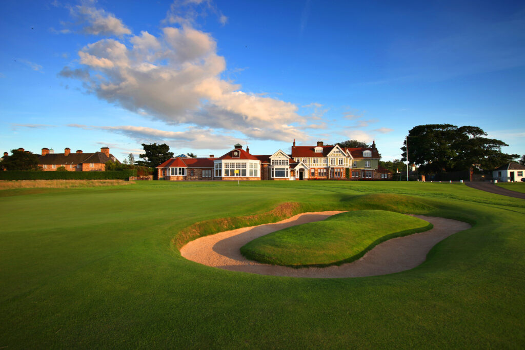 Building at Muirfield with hole with bunker