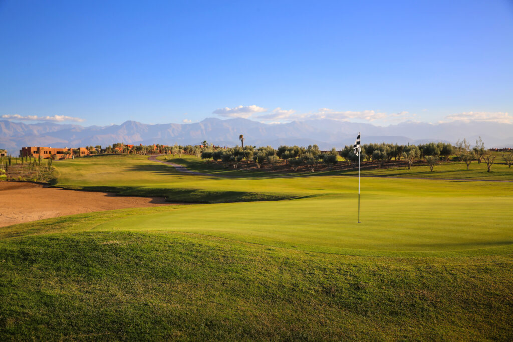 Hole with trees in background at Palm Golf Ourika