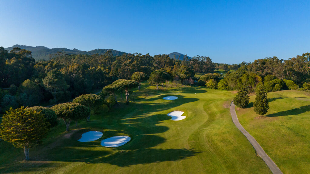 Aerial view of the fairway with bunkers and trees at Penha Longa Atlantic Course