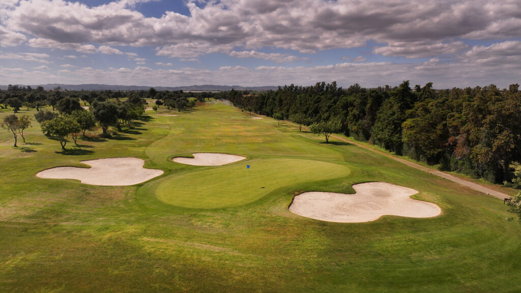 A green with bunkers around at Quinta De Cima Golf Course