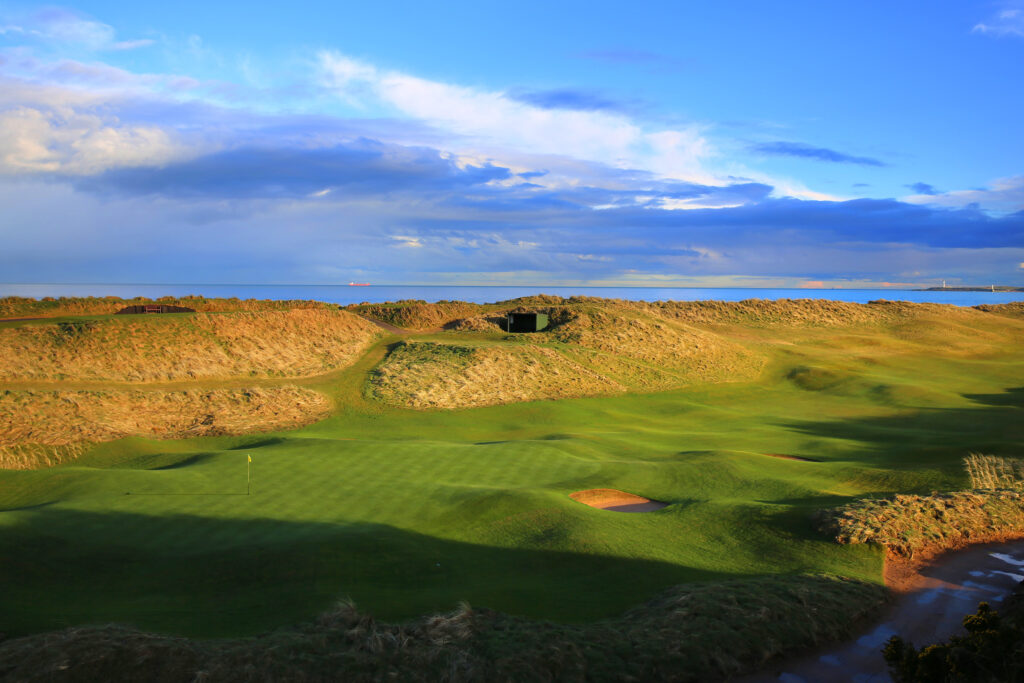 Fairway at Balgownie Links at Royal Aberdeen Golf Club with ocean in background