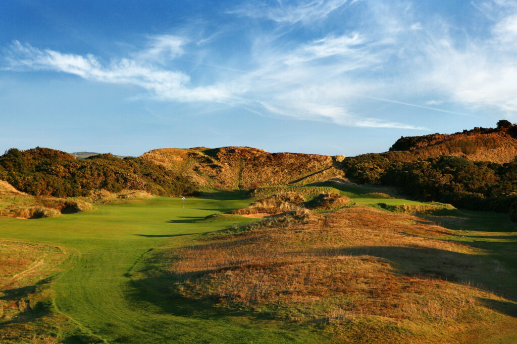 Hole at Annesley Links at Royal County Down with mounds around