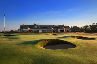 Hole with bunkers at Royal Troon - Old Course with building in background