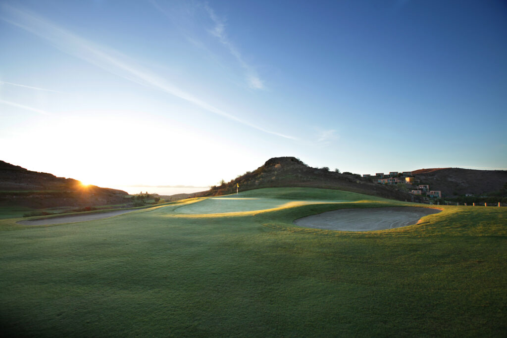 Hole with bunkers and hillsides around at Salobre Golf - Old Course