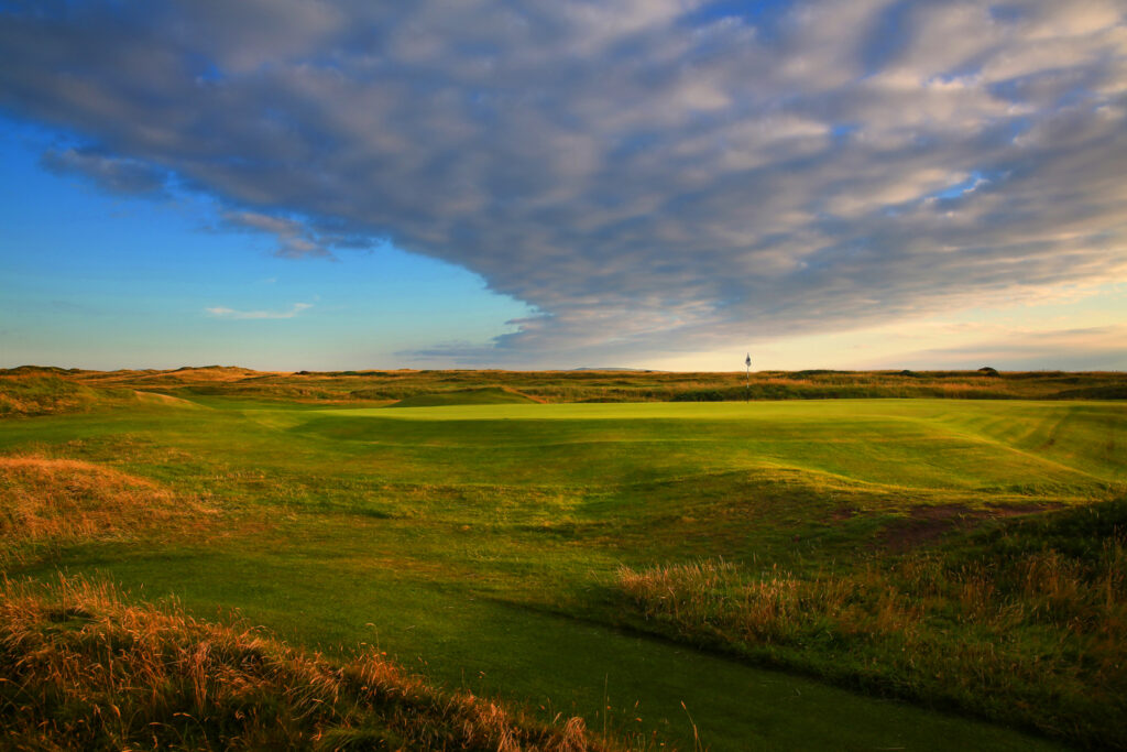 Fairway with hole with white flag at The Castle Course at St Andrews