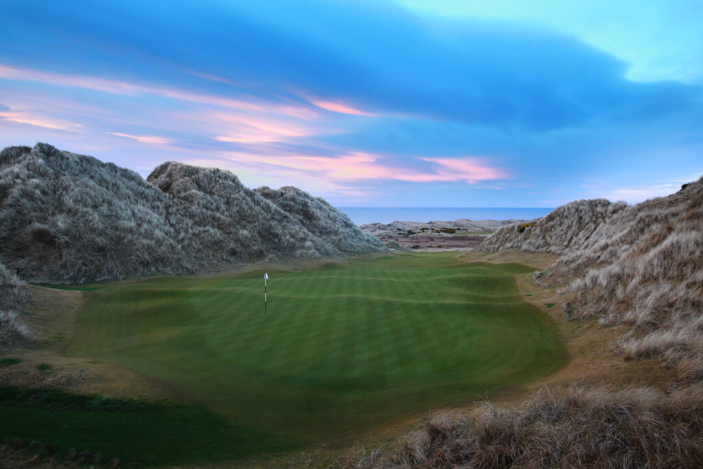 Hole with hills around at Trump International Golf Links