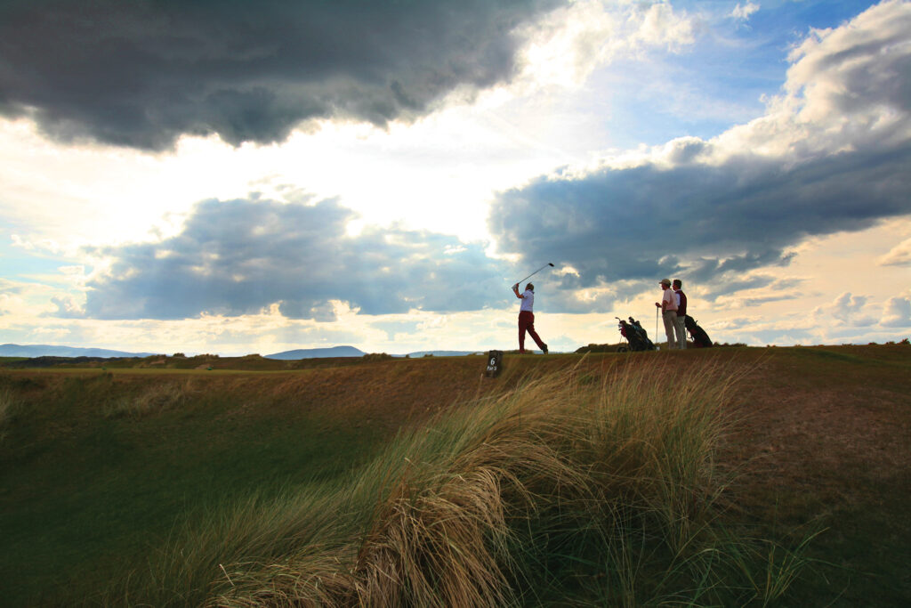 People playing golf at Castle Stuart Golf Links