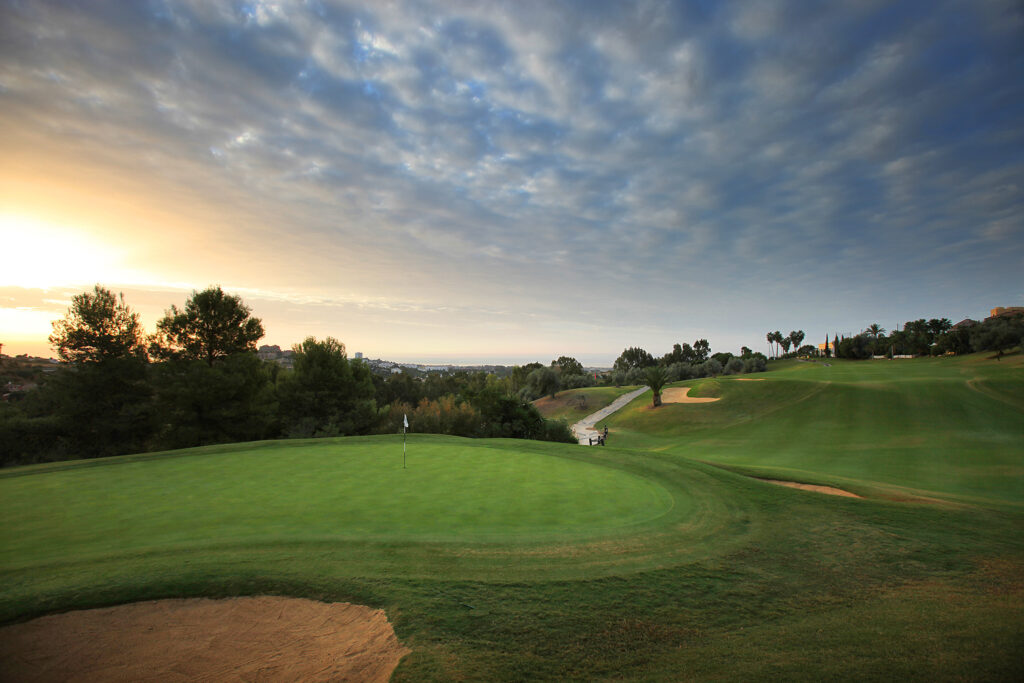 Hole with white flag overlooking the fairway at La Quinta Golf Course