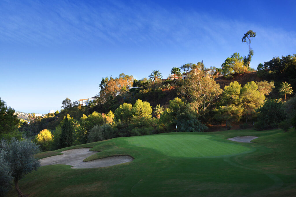 Hole with bunkers and trees around at La Quinta Golf Course