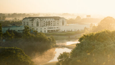 Exterior of Knightsbrook Hotel & Golf Resort at sunset