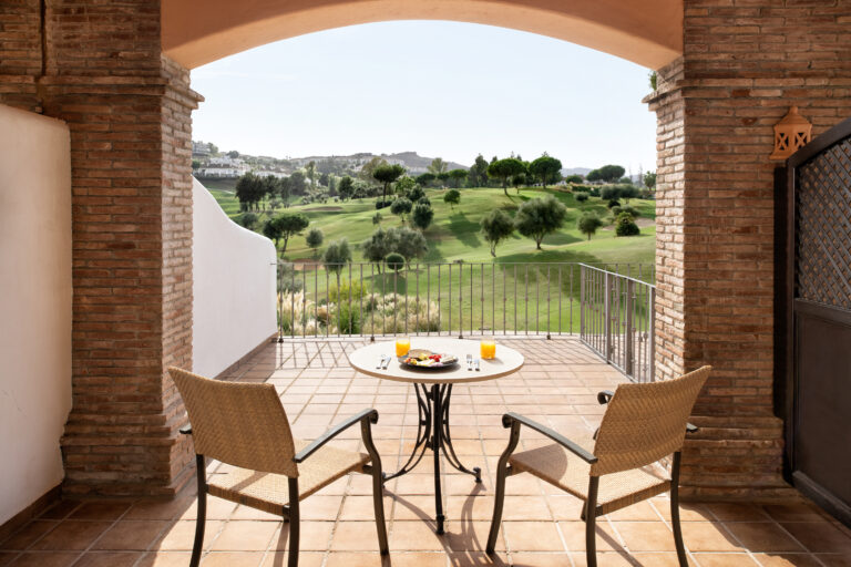 Balcony with table and chairs at La Cala Golf Resort