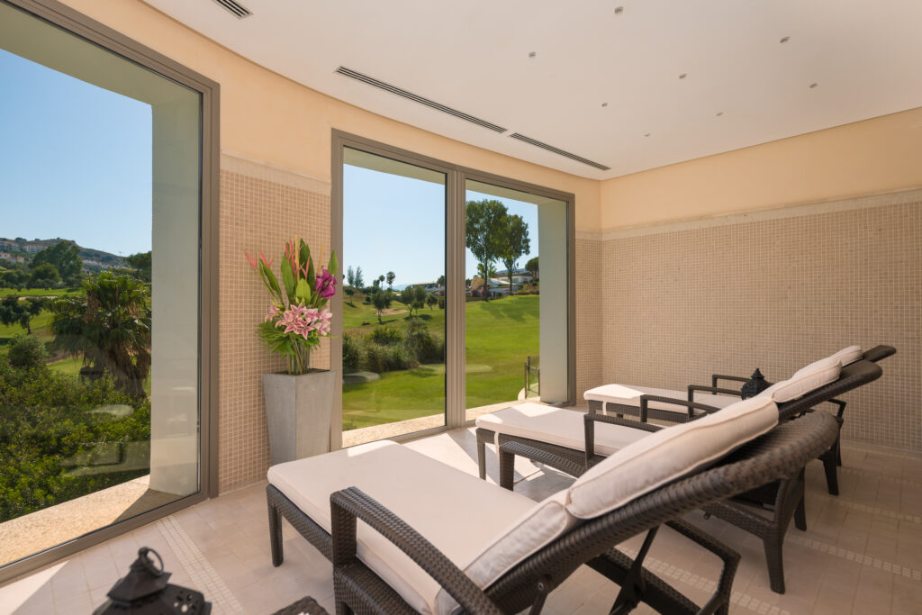 Loungers overlooking the gardens at La Cala Golf Resort