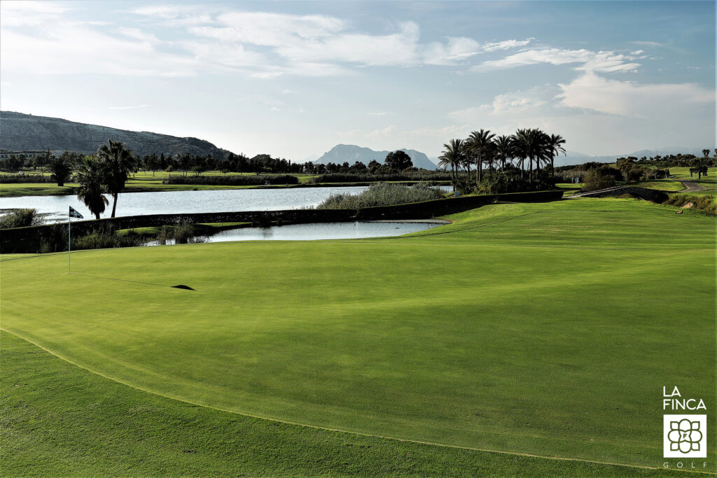 A hole with lake in background at La Finca Golf Course