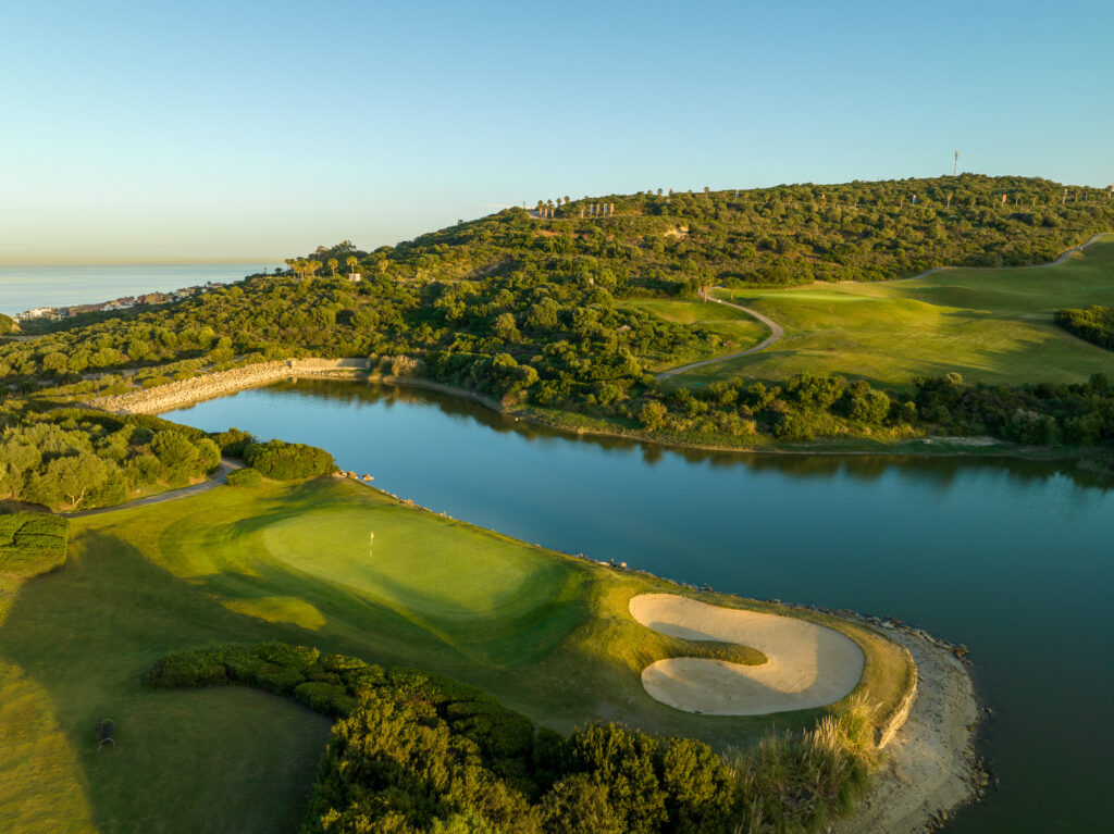 Fairway with lake at La Hacienda Alcaidesa Links Golf Resort - Heathland Course