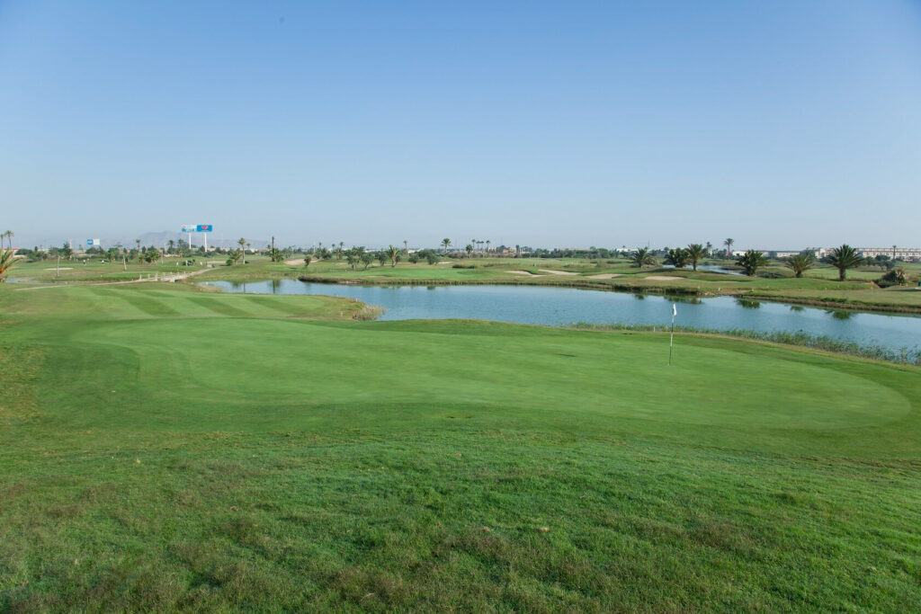 Hole with lake in background at La Serena Golf Course